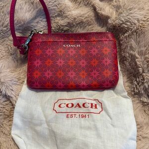 Coach Pink and Orange Waverley Woman’s Wristlet Bag